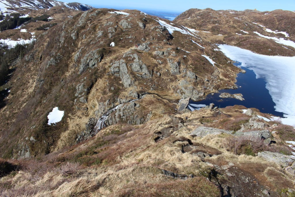 Rugged mountain trails and frozen lakes while hiking in Bergen, Norway