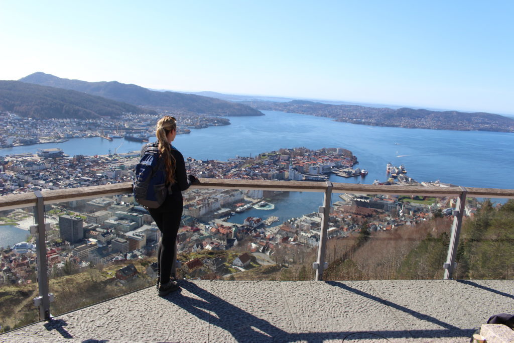 Maddy overlooking the town of Bergen and its surrounding lakes from a viewing balcony