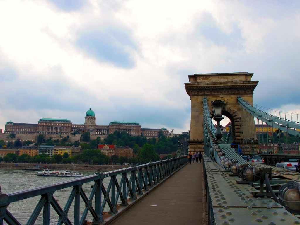 People walking on the side of the Chain Bridge - one of the best Budapest bridges