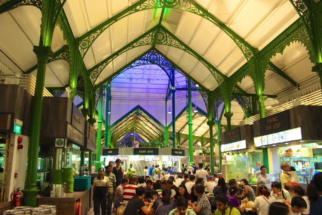 Groups of people dining at Lau Pa Sat at night