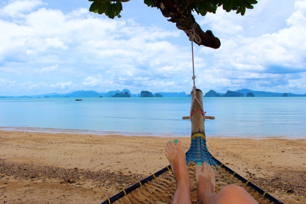 Hanging out on a woven hammock by the beach. This guide to Phuket will provide information on things to do so you can enjoy your vacation.
