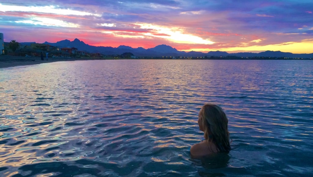 Maddy swimming in a beach in Mexico. In this Loreto travel guide, you'll find useful info on how you can spend one week in Loreto, Mexico.