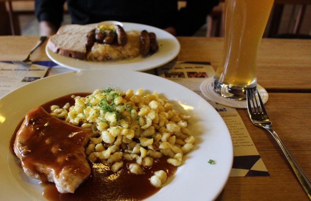 Delicious plate of German Spaetzle - one of the best dishes to try when you visit Berlin in your 20s