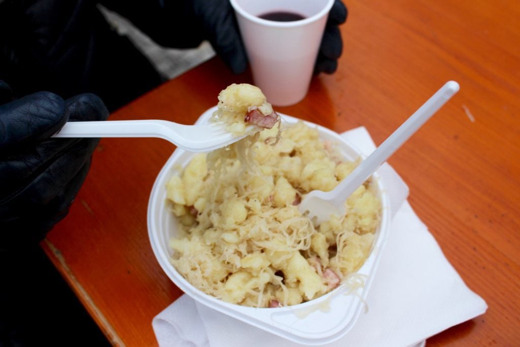 A bowl of halušky - a must-try Czech dish that will satisfy your Prague experience