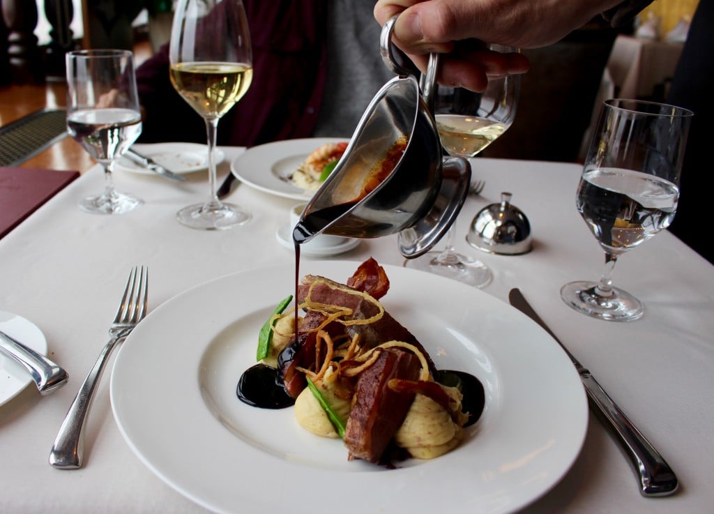 Perfectly cooked duck breast atop a potato-bacon purée, with red cabbage confit and a honey-balsamic glaze