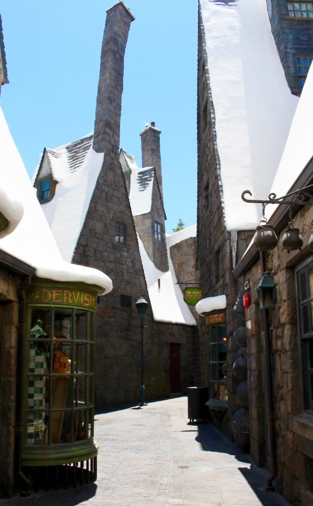 Hogsmeade shops with thick snow on their roofs