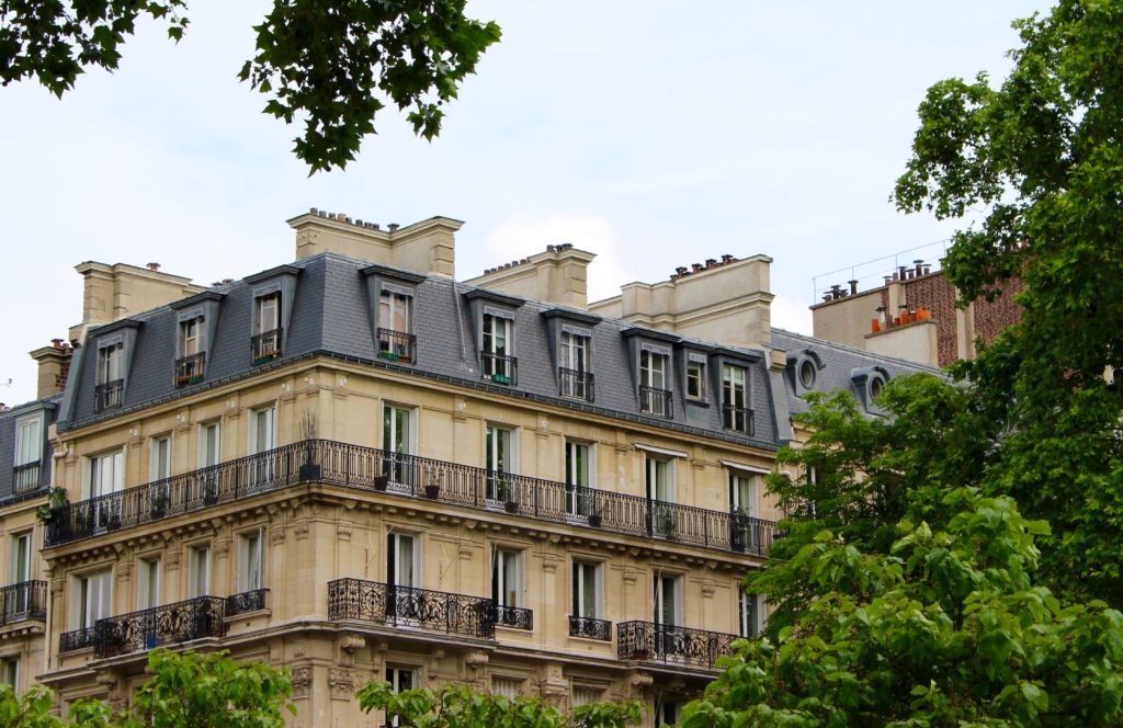 Traditional building in Paris at daytime. If you want to explore Paris attractions, don't forget to book your Paris Day Bike Tour.