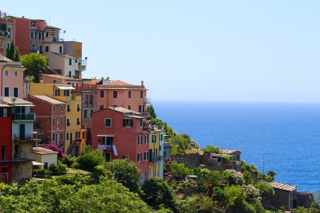 Bright-colored houses by the sea in Corniglia