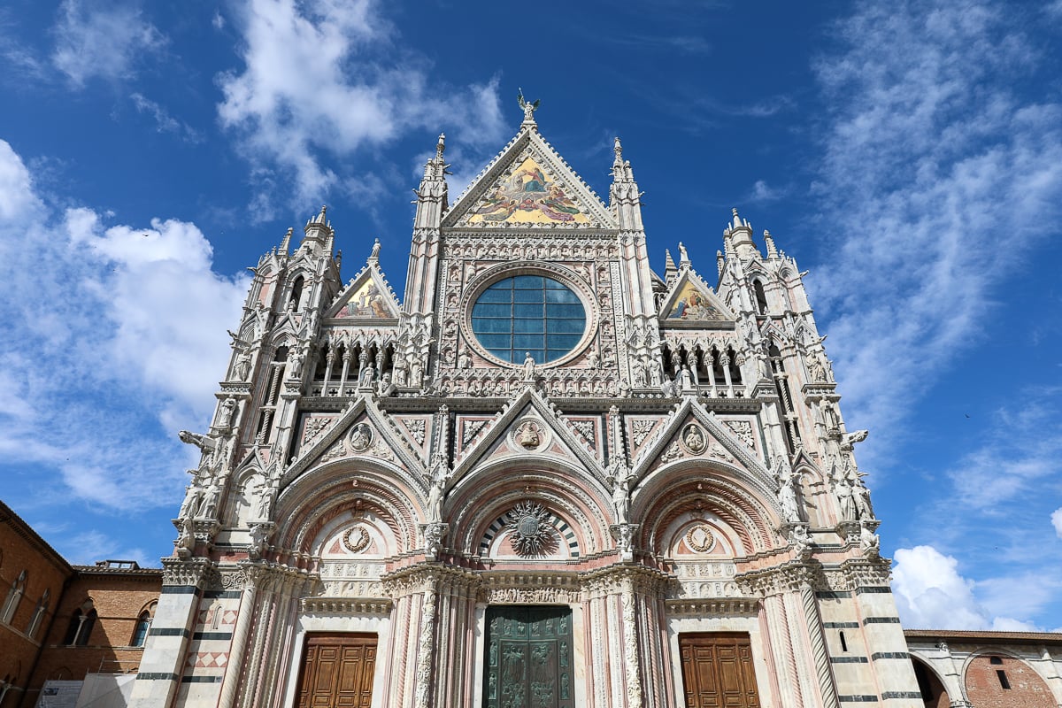 Beautiful exterior of Duomo, a Romanesque-Gothic cathedral in Siena