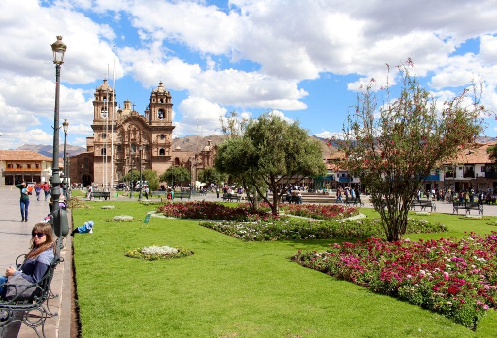 Beautiful gardens at the Plaza de Armas on a sunny day