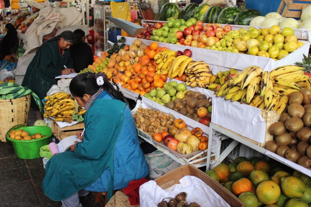 A stall in Mercado Central de San Pedro selling different types of fruits. Your three days in Cusco won't be complete without experiencing its flavorful food culture.