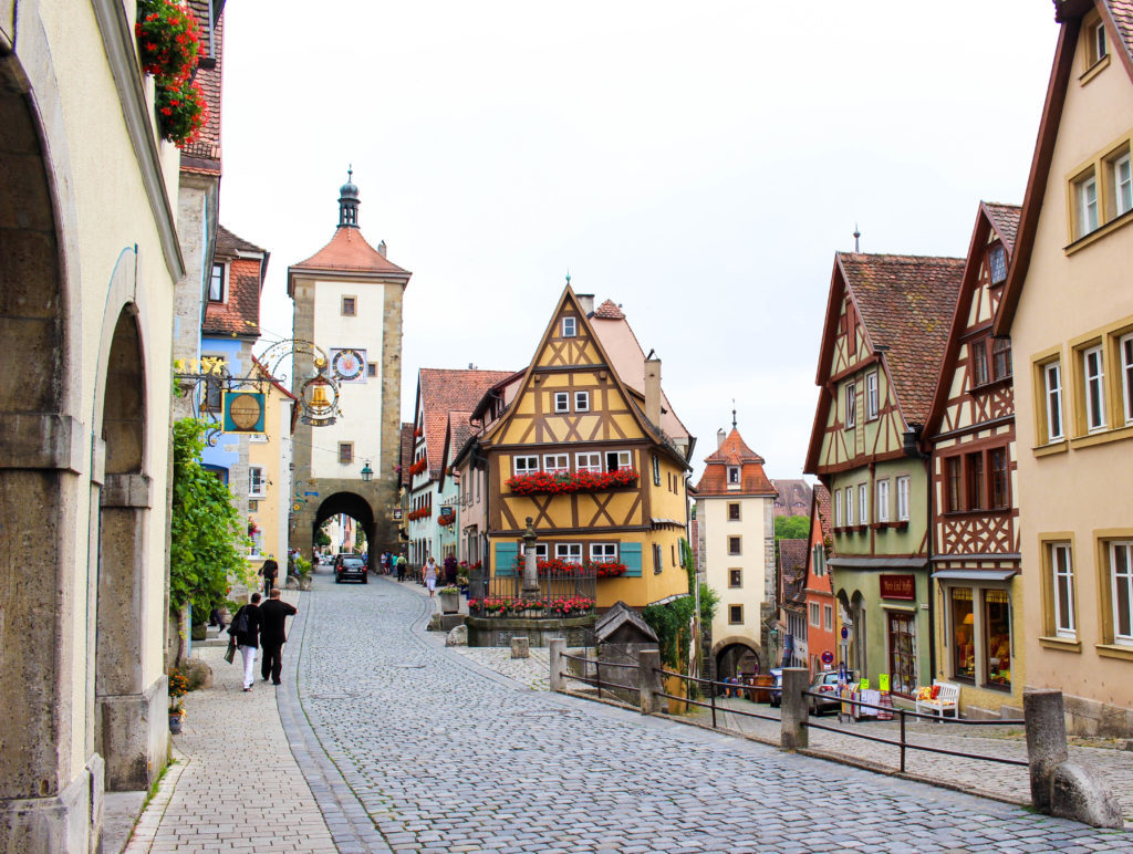 Cobblestone street surrounded by beautiful medieval buidings in Rothenburg ob der Tauber