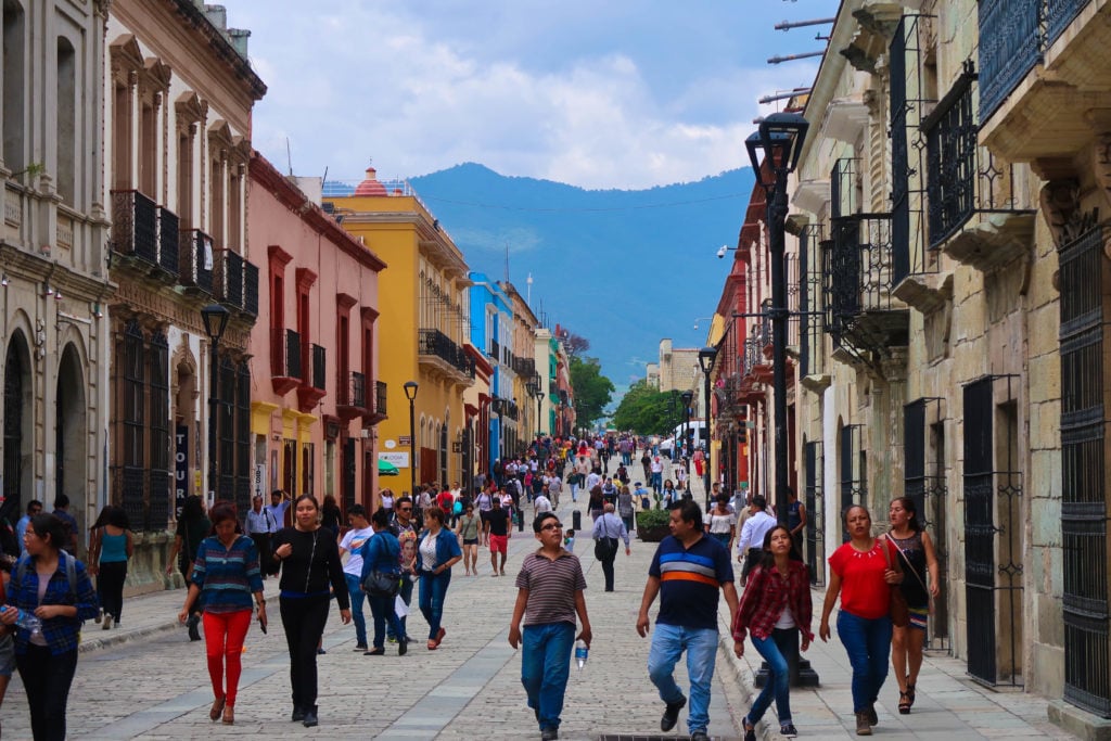 Locals walking along the main pedestrian street in Oaxaca City