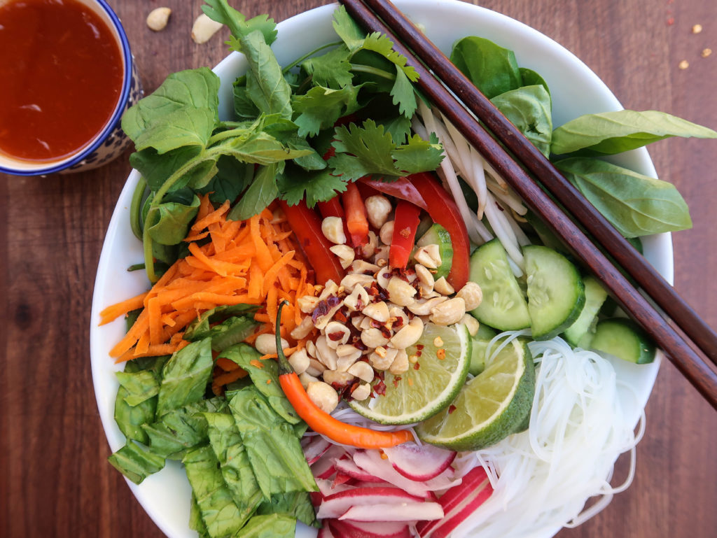 In need of a delicious Vietnamese meal? Then this bún chay is for you. This vegetarian bún chay recipe is absolutely delicious. Bright, fresh, crunchy, tangy, spicy, and herbaceous, you will love this Vietnamese noodle salad. Full of fresh vegetables, vibrant herbs, and a zingy dressing, this bún chay couldn't be more healthy or satisfying. Plus, it's easy to make, and you can easily make this recipe vegan, or add proteins of your choice. Yum!