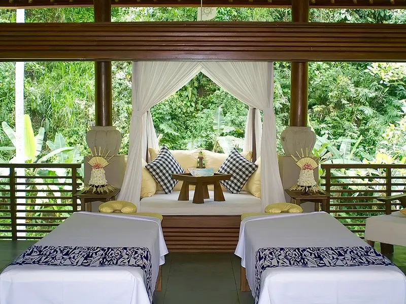 Two spa beds at Maya Ubud Resort & Spa. During your one week in Ubud, do not miss the chance to relax on a spa.
