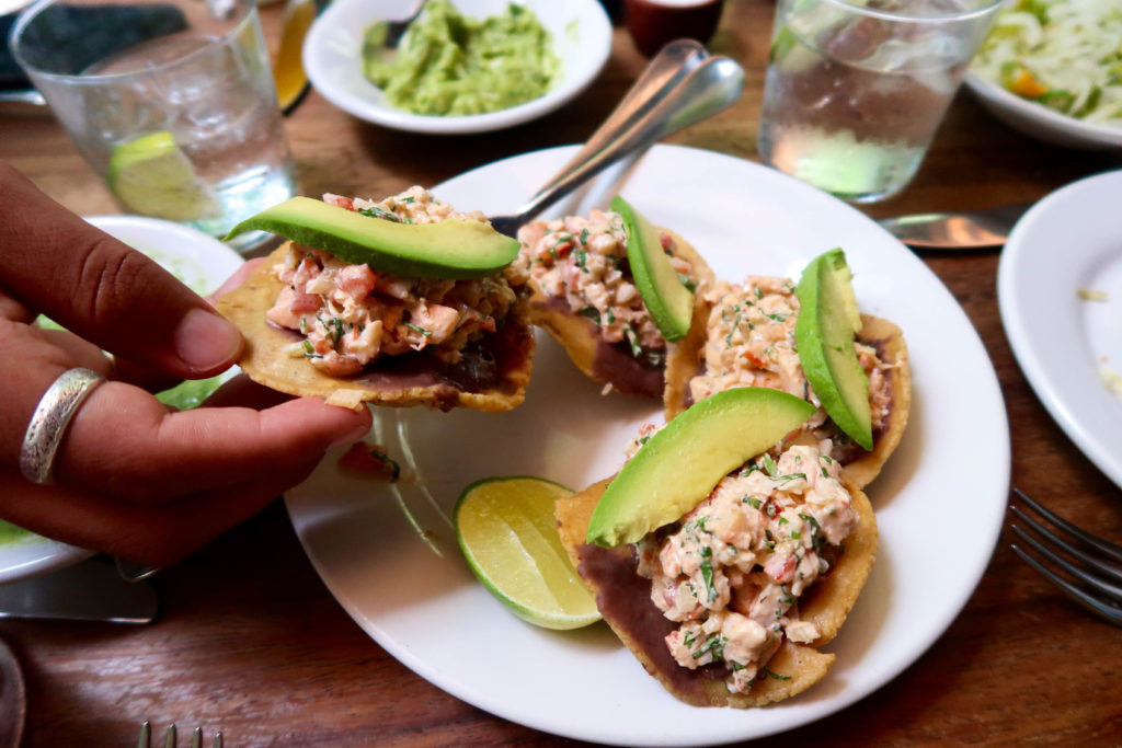 Tuna tostadas on a plate. This Mexico City foodie guide recommends eating at Contramar for scrumptious coast-inspired meals.