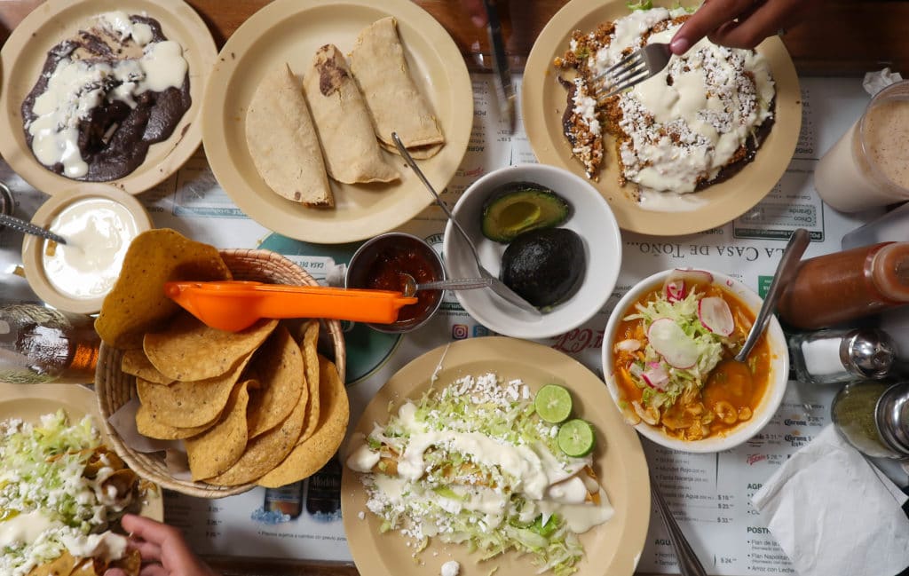 Table full of traditional Mexican food in Mexico City