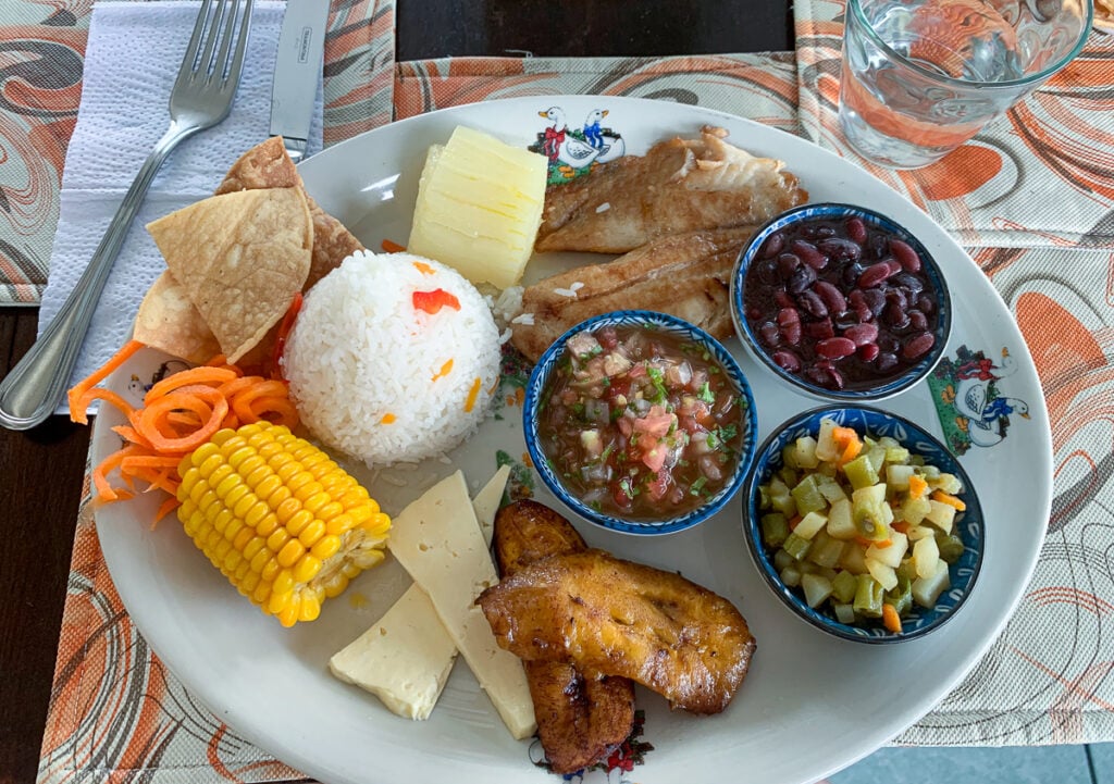 Lunch at a typical restaurant in Costa Rica with corn, salsa, rice, and other ingredients