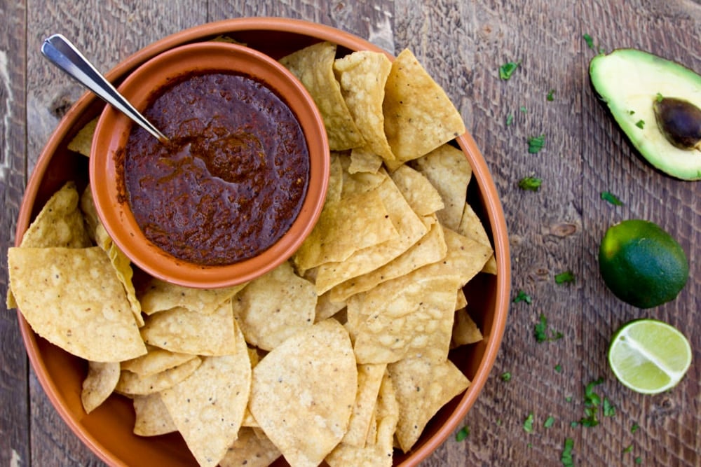 Tortilla chips with salsa roja