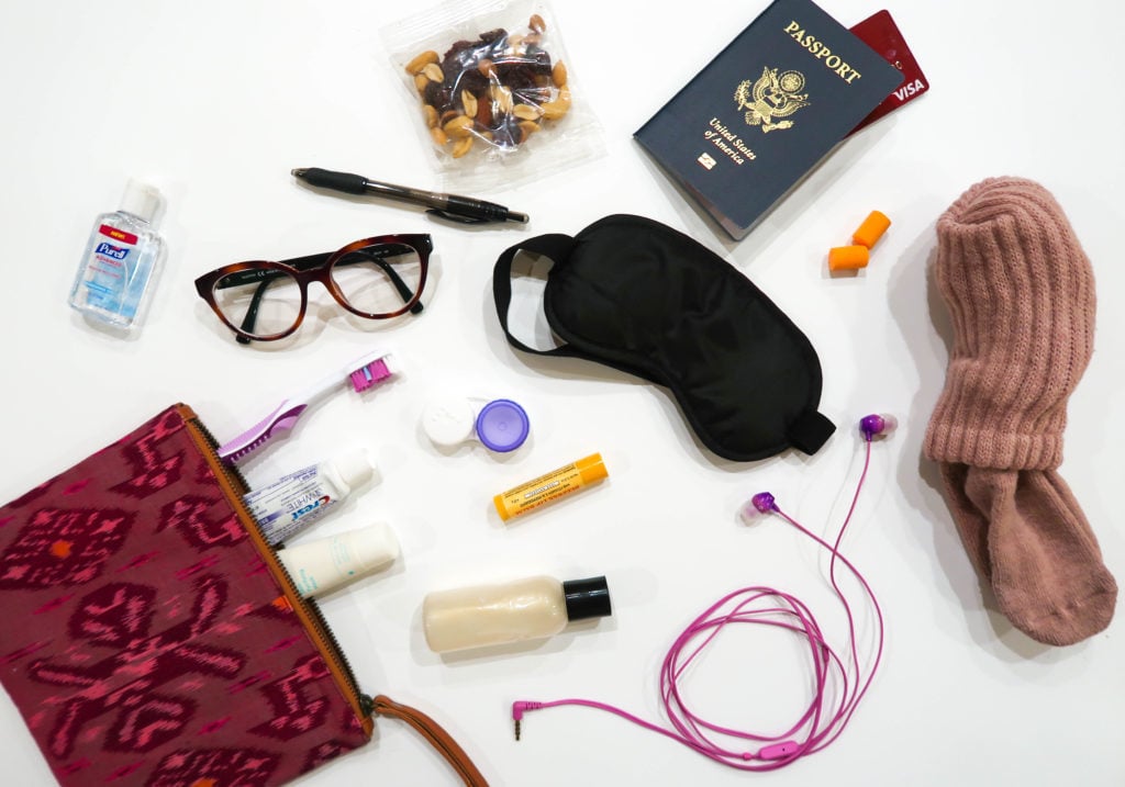 If you want to survive a long flight, then you need to create your own travel comfort pack to put in your carry-on bag! Here's how to make a comfort pack.