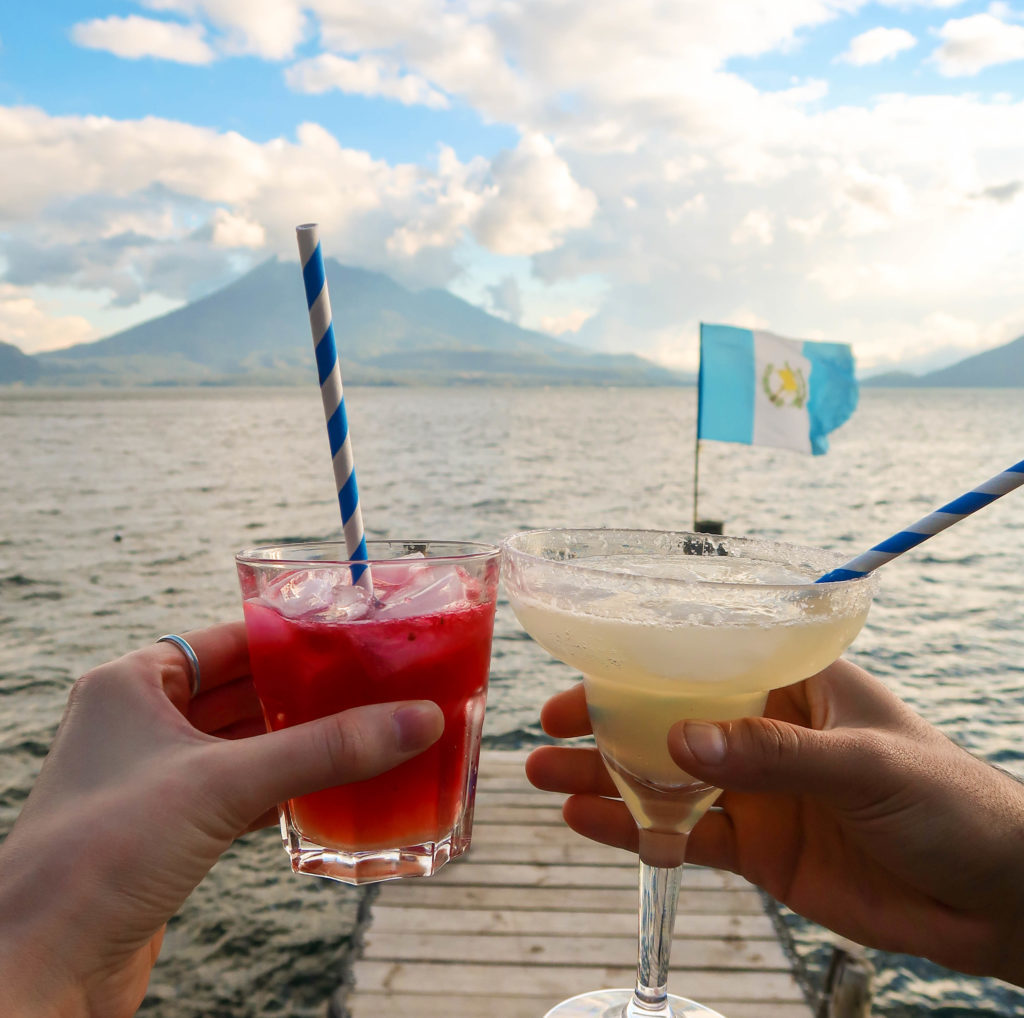 cocktails with lake atitlan in the background. 