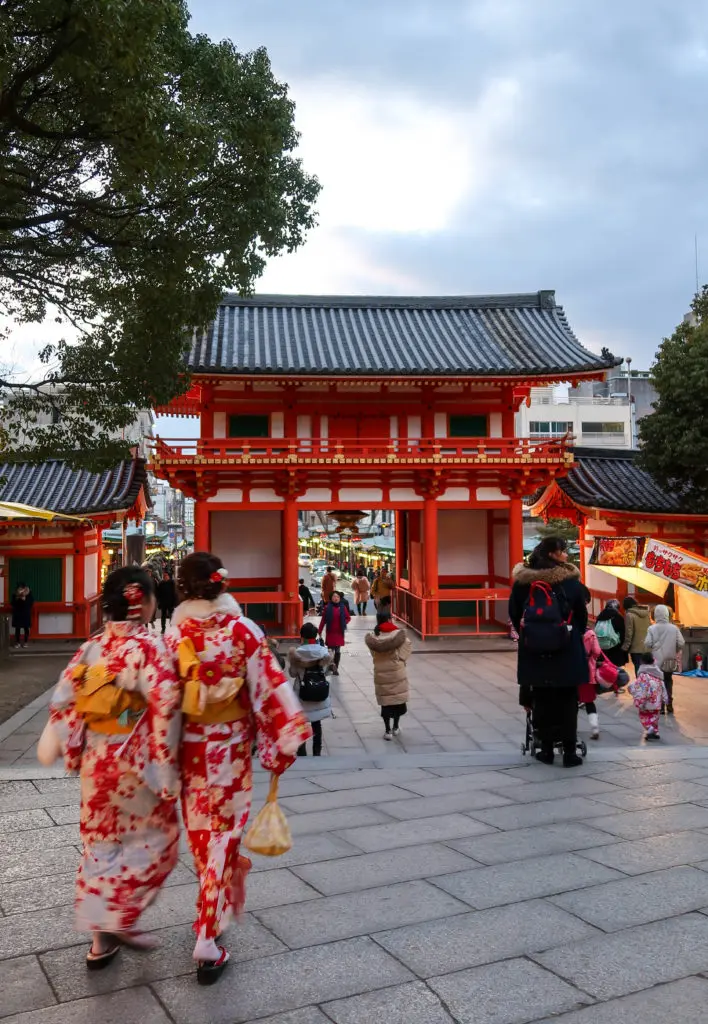A crowd of people in Kyoto during daytime