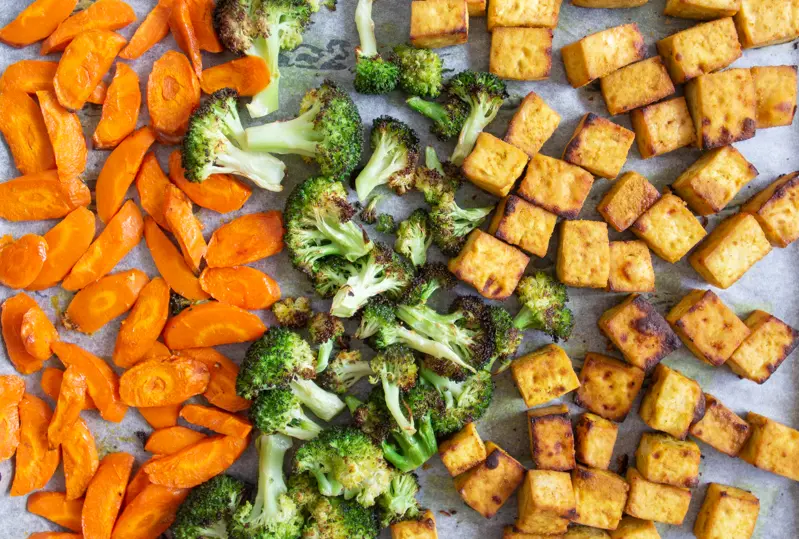 Roasted veggies and tofu for vegan palak paneer.
