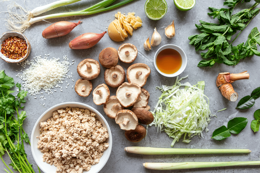 The ingredients for vegan larb include mushrooms, tofu, lemongrass, kaffir lime leaves, cabbage, cilantro, mint, garlic, fish sauce, and palm sugar!