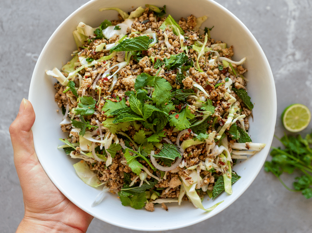 Authentic recipe for vegan larb, made with shiitake mushrooms and crumbled tofu.