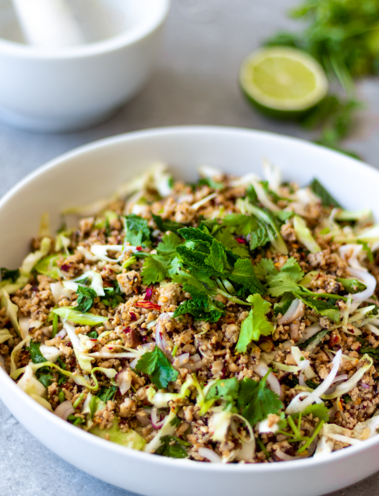 This larb is made with shiitake mushrooms and crumbled tofu. It's packed with texture and the flavors of lime, chili, toasted sticky rice, lemongrass, and fresh herbs. It's probably the greatest salad ever created - and that is no exaggeration!