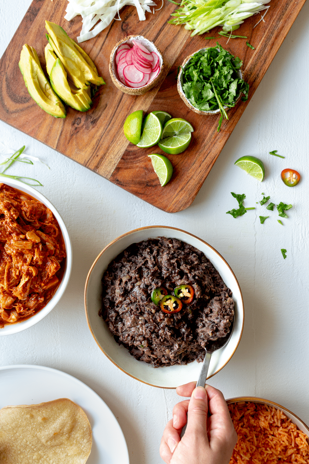 This recipe for 20-minute, easy refried black beans is hard to beat. Packed with the flavors of garlic, onion, and jalapeño, these black beans are the perfect addition to every Mexican-inspired meal. (You'd never expect they're canned beans!)