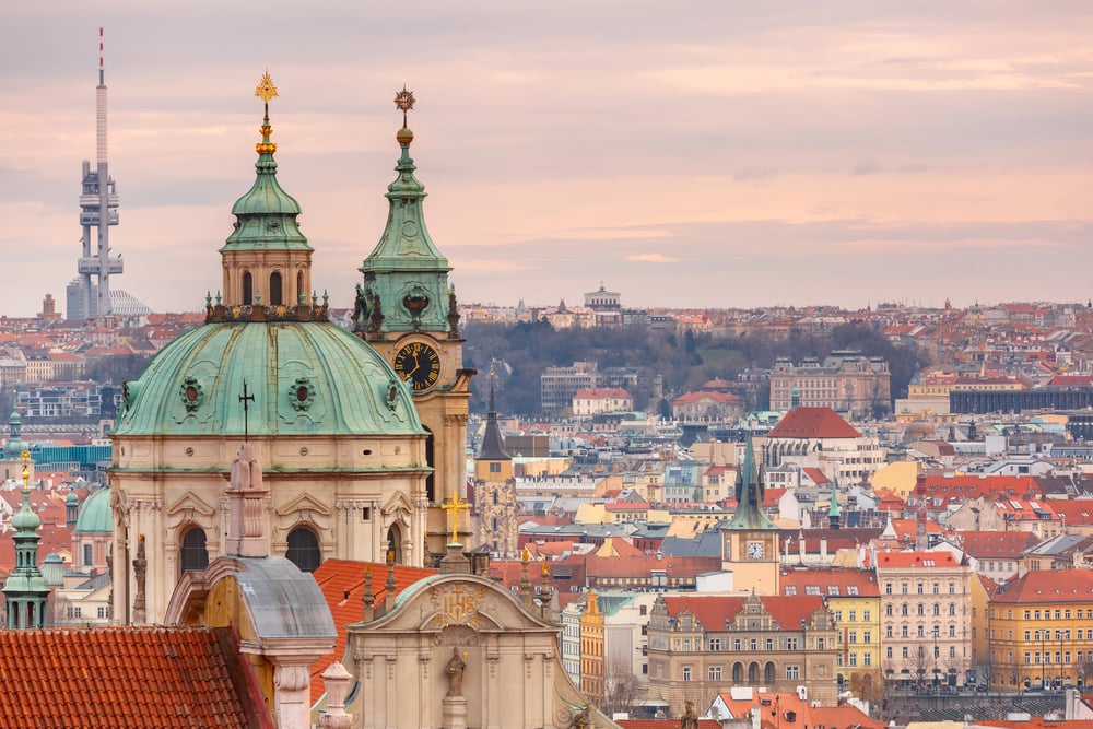 Dome and clock tower of a church in Old Town Prague