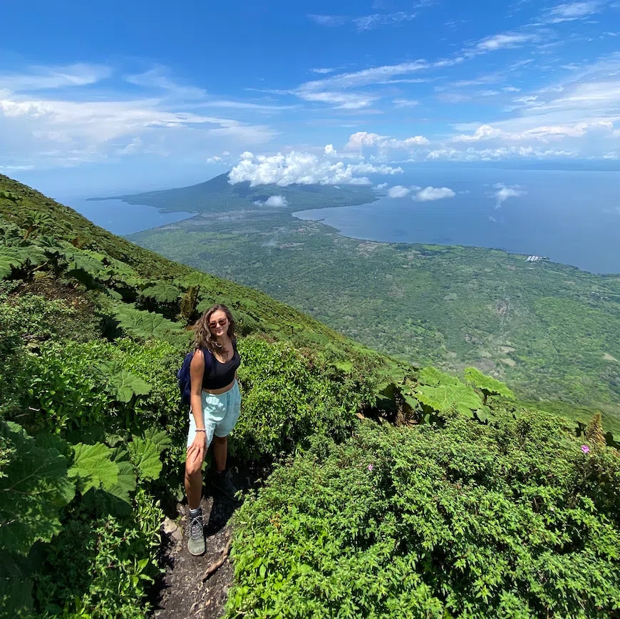 Melanie hiking up a volcano in Nicaragua - she is a solo female traveler in Nicaragua with lots of experience to answer the question: "is traveling to Nicaragua safe?"