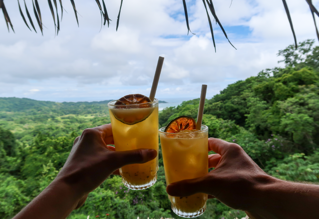 Cocktails overlooking the jungle and ocean in Nosara, Costa Rica