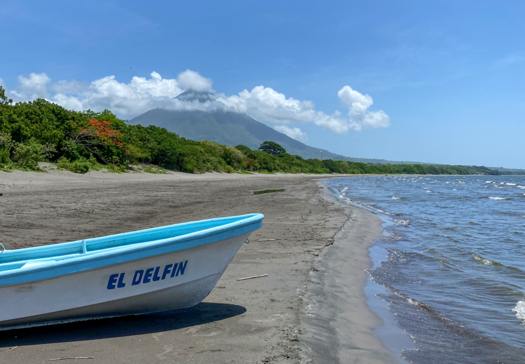 Boat on the beach with Concepcion Volcano in the background