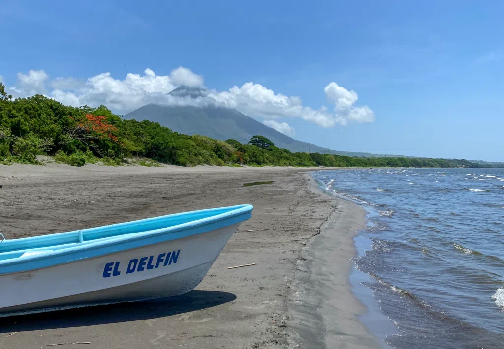Boat on the beach with Concepcion Volcano in the background