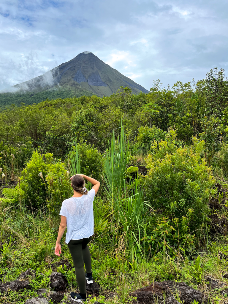 Maddy at Arenal Volcano in Costa Rica during the wet season
