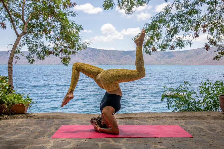 Melanie doing yoga in Laguna de Apoyo, Nicaragua - she is a solo female traveler in Nicaragua with lots of experience to answer the question: "is traveling to Nicaragua safe?"