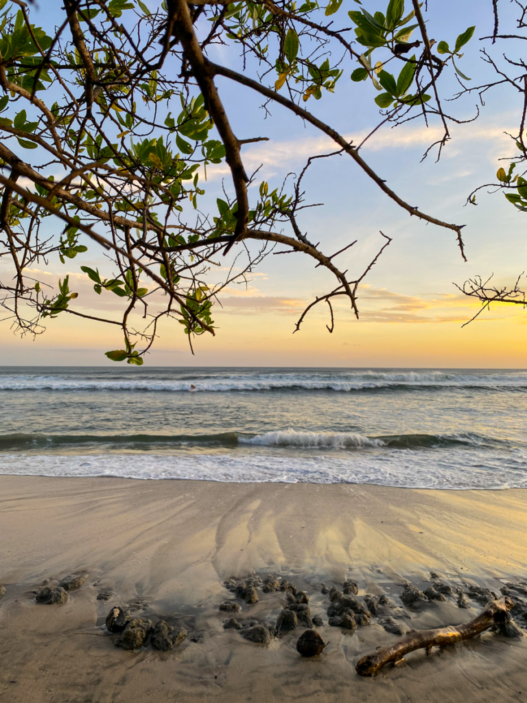 Beautiful sunset and ocean waves at Playa Negra