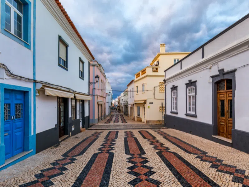 Cobblestone streets and colorful houses in Lagos, Portugal