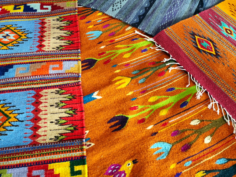 Colorful textiles are one of the best things to buy as souvenirs in Oaxaca - and shopping for traditional crafts is one of the best things to do in Oaxaca. 