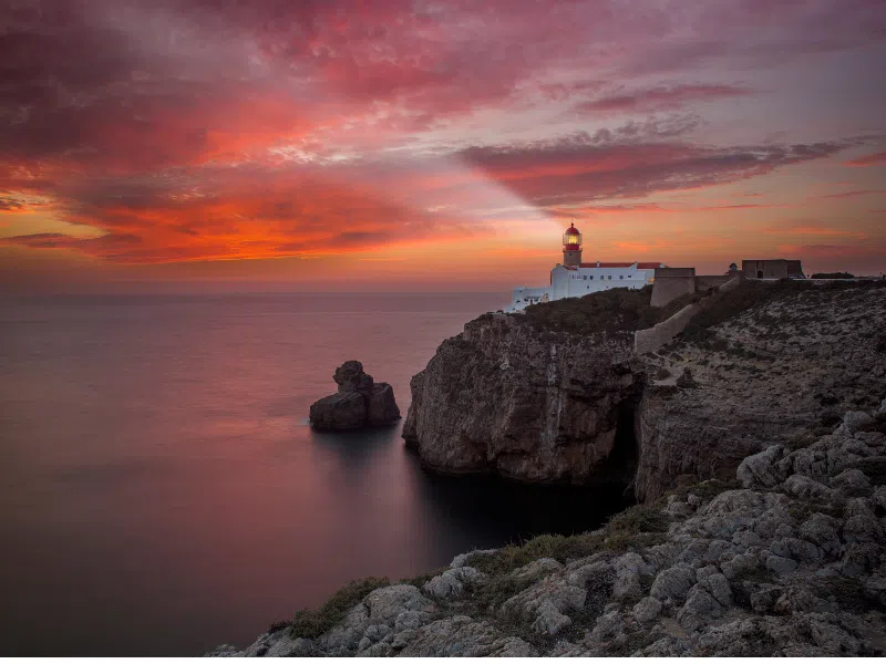 Sunset over the Atlantic Ocean and the Sagres Lighthouse