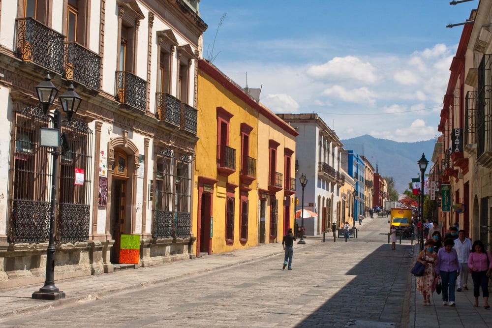 Street in Oaxaca City showing the different colors and building types