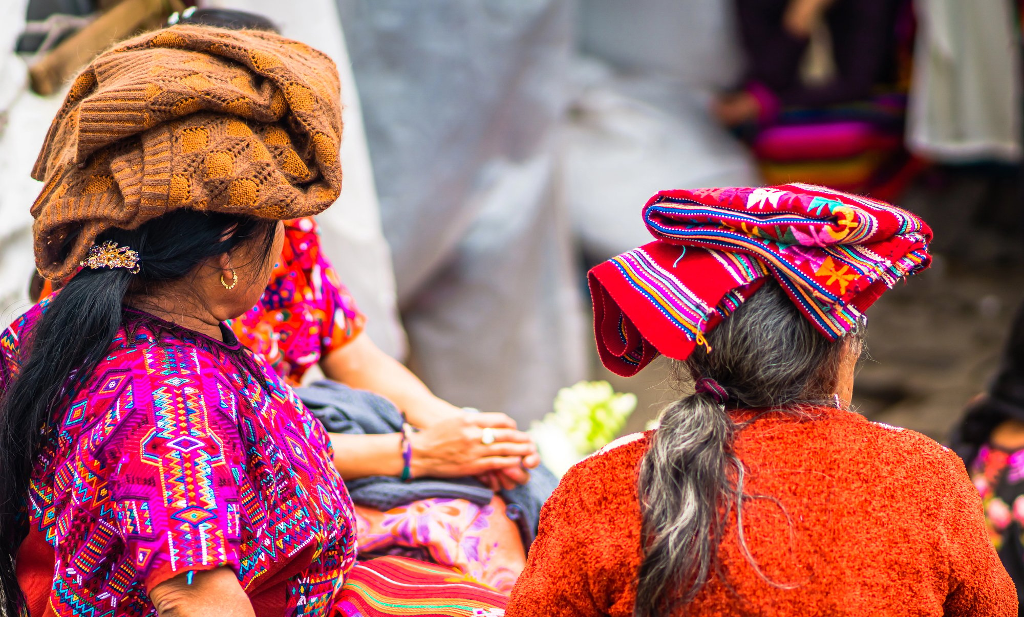 Ladies selling woven clothing at the Chichi Market