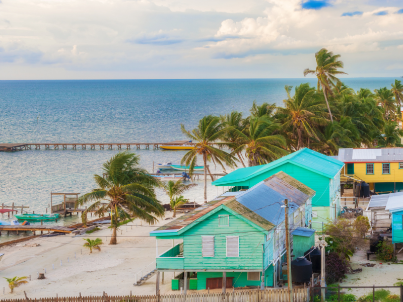 Colorful houses at Caye Caulker - one of the best destinations in Belize to include in a Belize Itinerary.