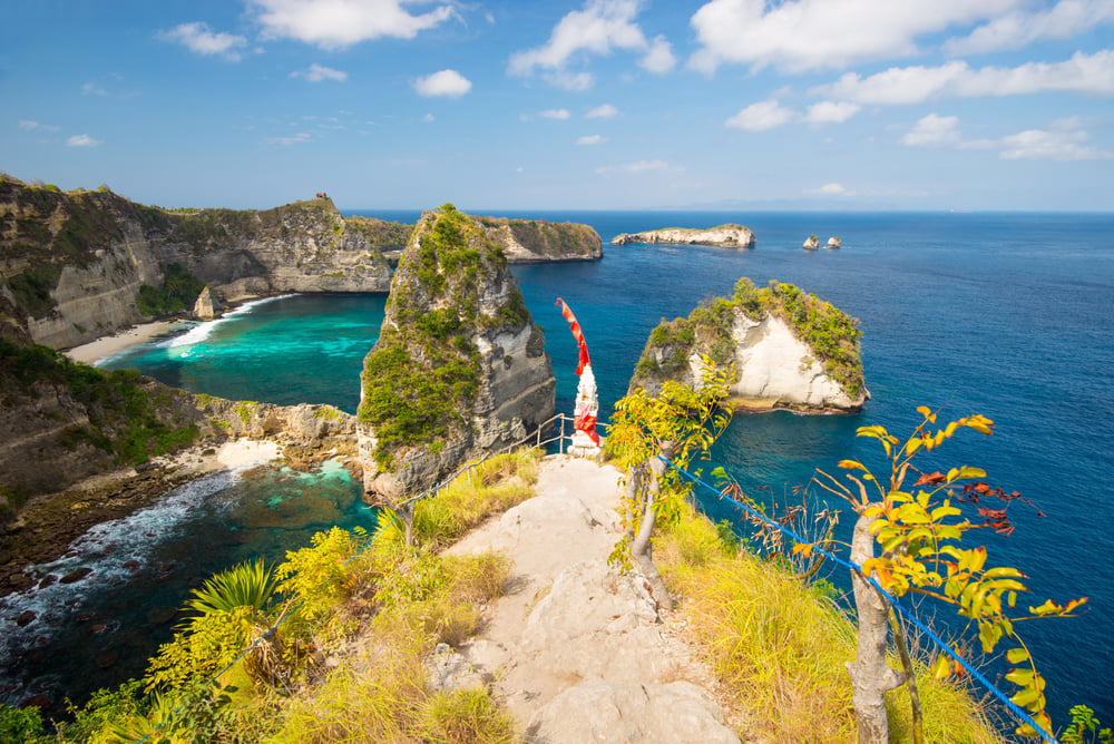 Nusa Penida Thousand Islands Viewpoint with the red and white shrine in the centre of the image