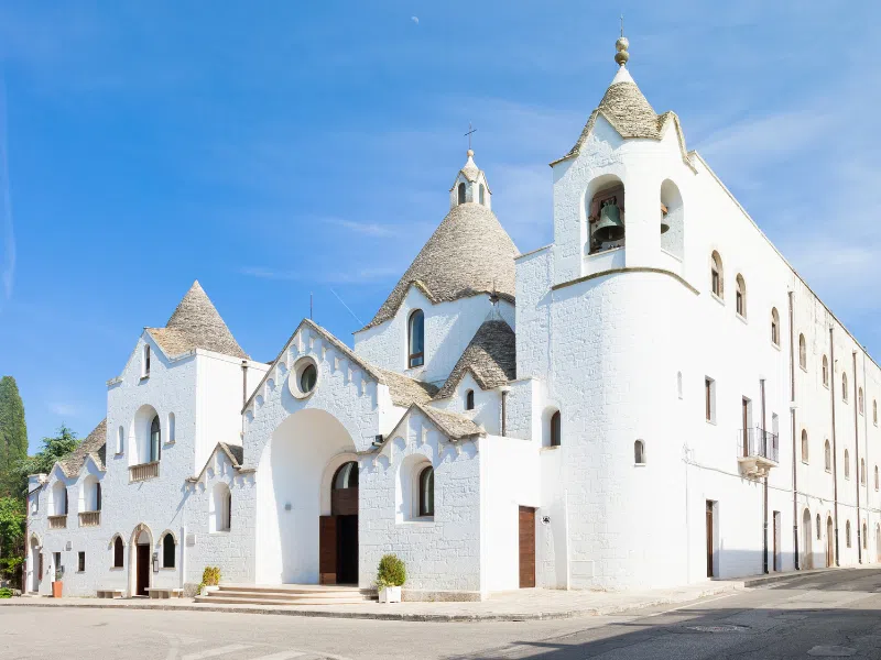 Visiting the trullo church is one of the best things to do in Alberobello, Italy