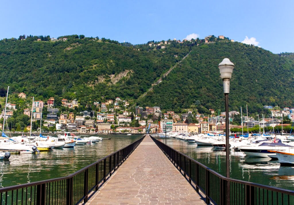 The lakeside promenade and pier in Lake Como. 