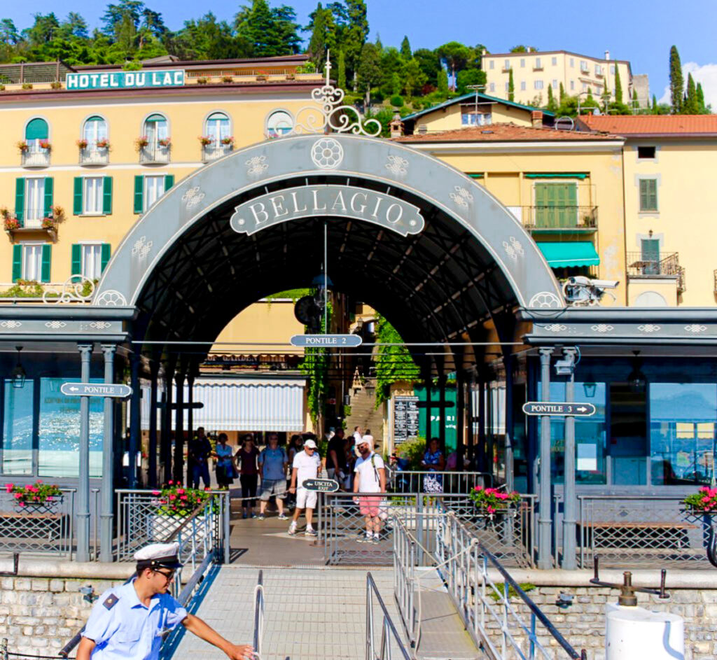 Arriving at the ferry port in the town of Bellagio on the shore of Lake Como. Bellagio is one of the must-see towns on a day trip from Milan to Lake Como.
