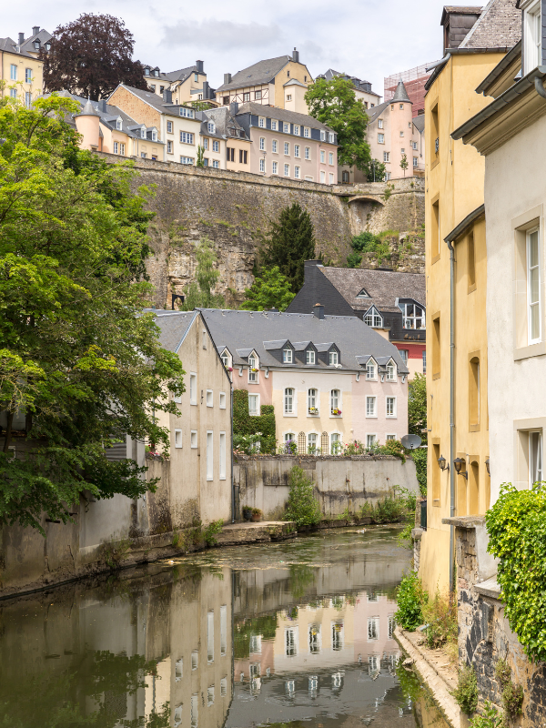 View of the Alzette River and canals in Luxembourg City. The beauty here is one reason why Luxembourg City is worth visiting.